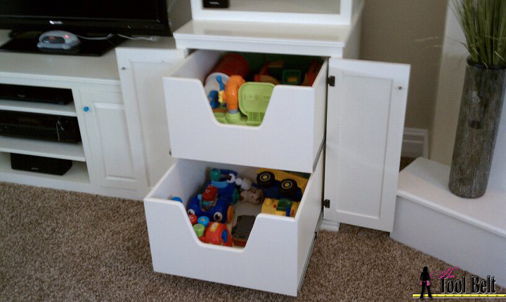 Media center with toy box drawers Media system with toy box drawers