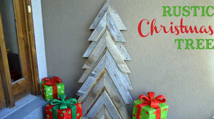 An easy way to add natural elements into your Christmas decor, build a rustic Christmas Tree from pallets or barn wood.