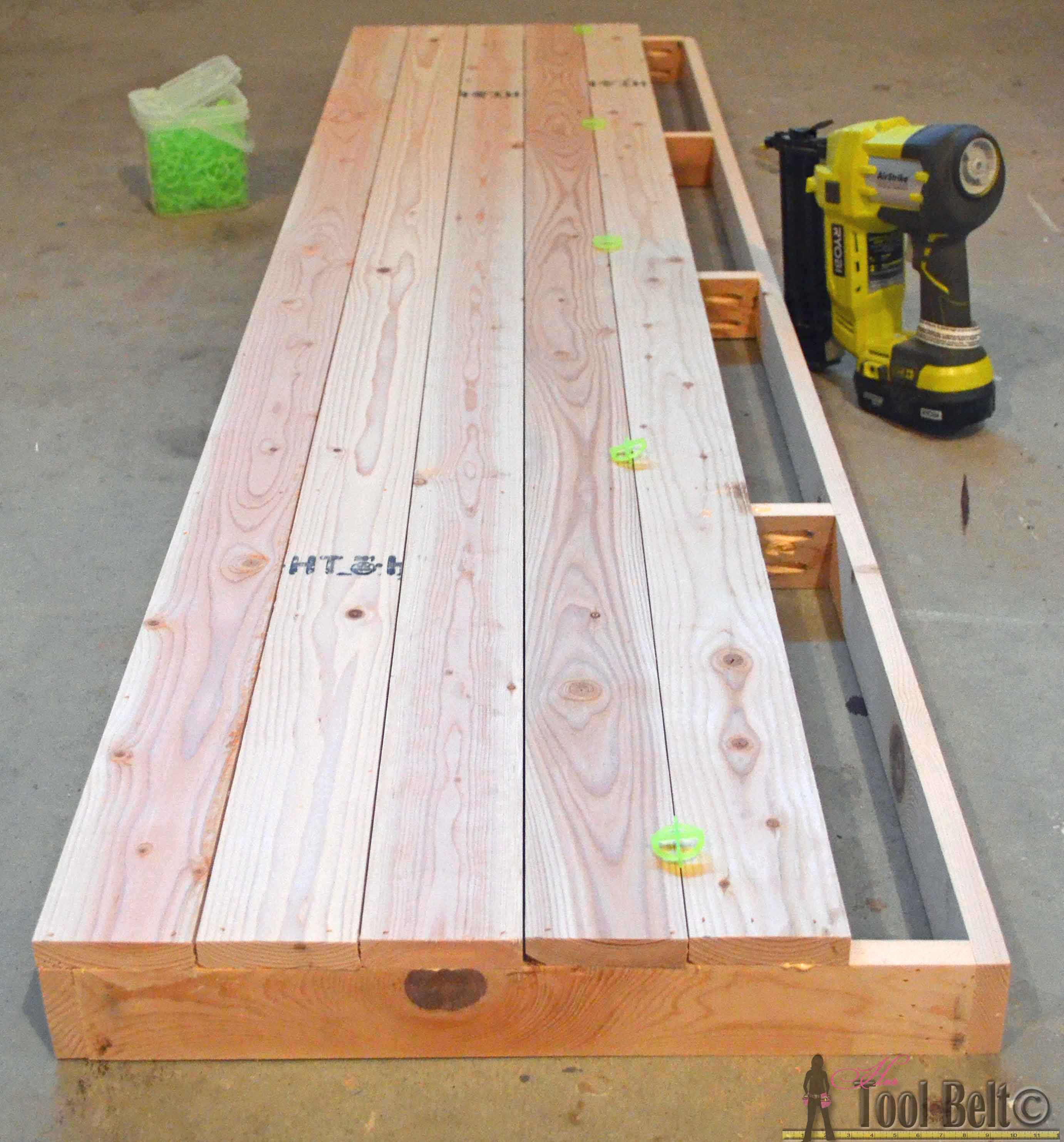 Build a console table with awesome scroll legs, definitely a statement piece! Free woodworking plans.