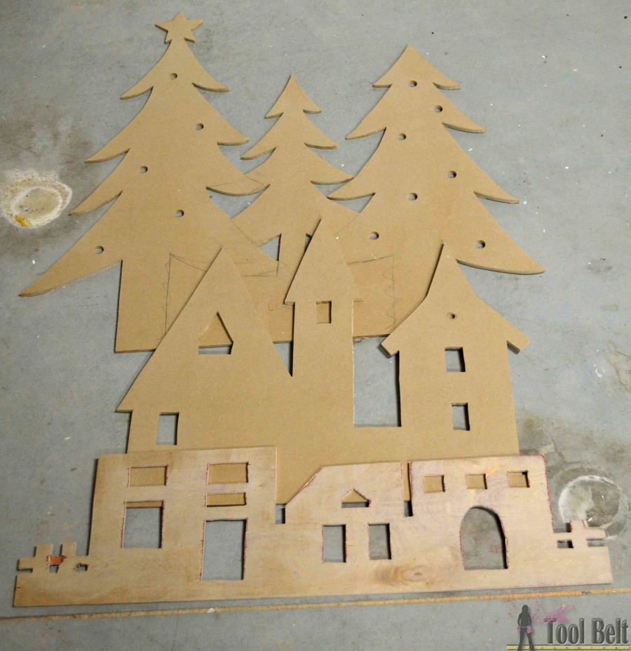 DIY Pottery Barn Kid's inspired Christmas village silhouette.