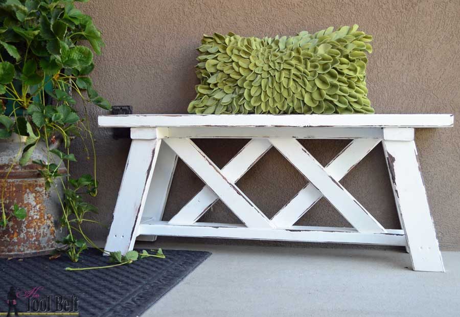 Build a cute little DIY outdoor bench for your porch or entry. Use 2x4's (and 2x3's) to build it for only about $13!!! Free plans