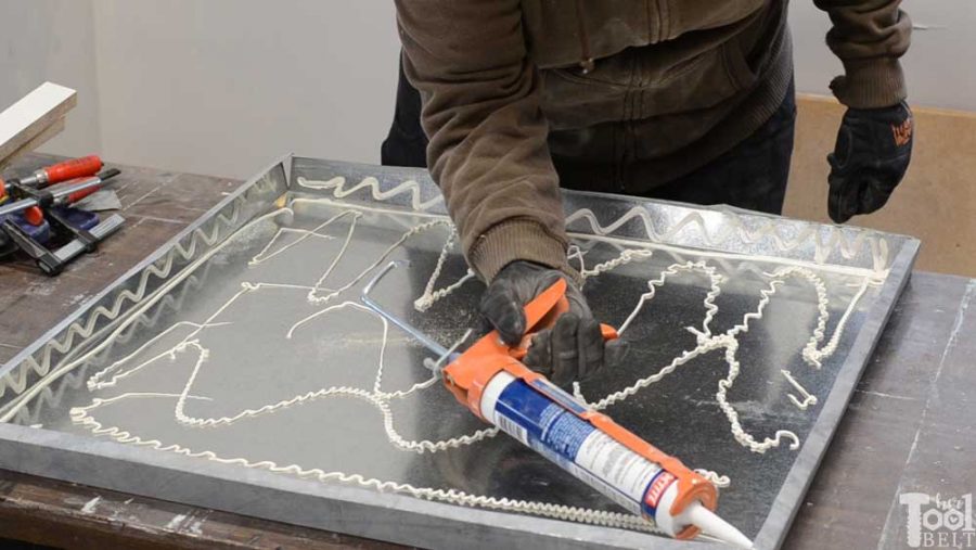 DIY farmhouse side table tutorial and free plans with optional drawer and zinc table top.