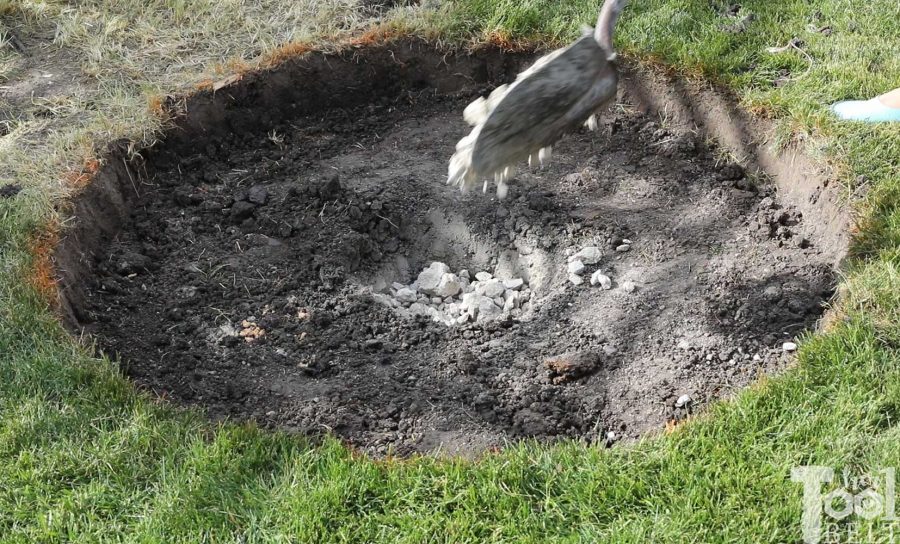 add a drain - How to build a DIY backyard firepit with wall blocks from Home Depot.