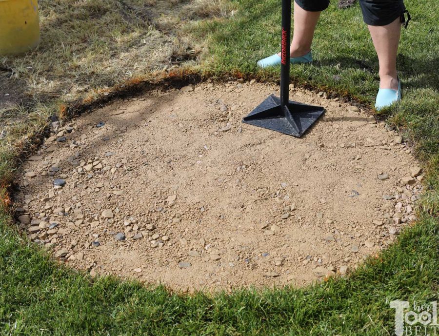 tamp the base - How to build a DIY backyard firepit with wall blocks from Home Depot.