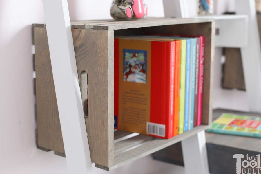Weathered gray crates. Free plans to build an easy leaning crate ladder bookshelf and desk system for kids. The crates are great to organize and store books and toys. Free plans on hertoolbelt.com